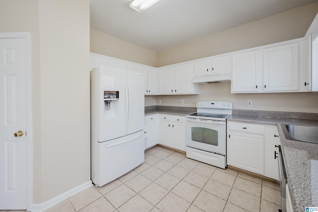 kitchen with white appliances, light tile patterned floors, a sink, white cabinets, and under cabinet range hood