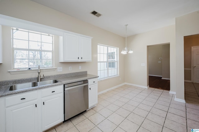 kitchen with dishwasher, a healthy amount of sunlight, visible vents, and a sink