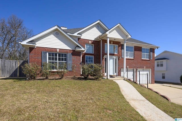 view of front of house with fence, concrete driveway, an attached garage, a front yard, and brick siding