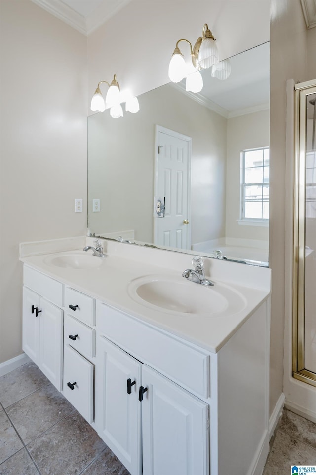 full bath featuring double vanity, ornamental molding, a shower with door, and a sink