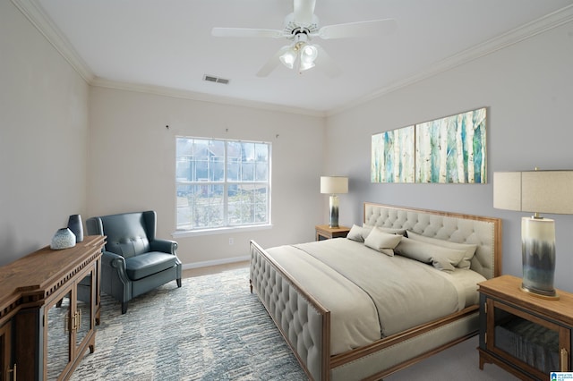 bedroom featuring a ceiling fan, baseboards, visible vents, carpet floors, and crown molding