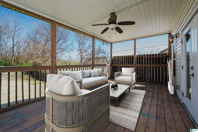 wooden terrace featuring an outdoor hangout area and a ceiling fan