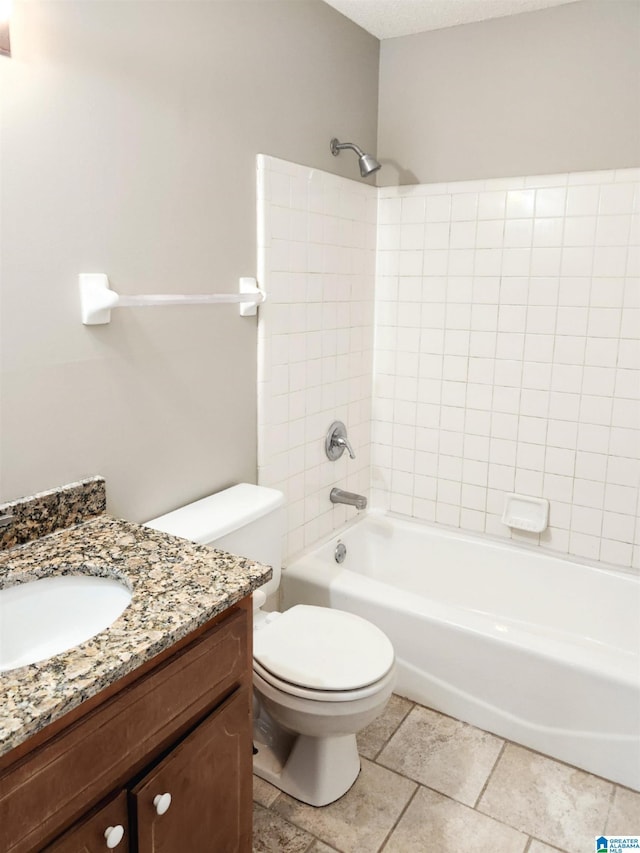 full bathroom featuring vanity, shower / bathing tub combination, toilet, and tile patterned flooring