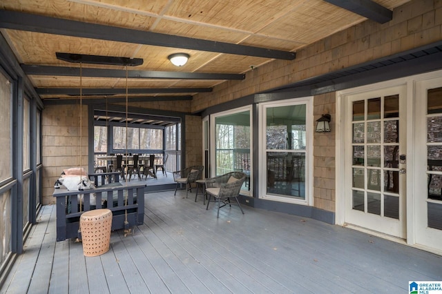 wooden deck with outdoor dining space