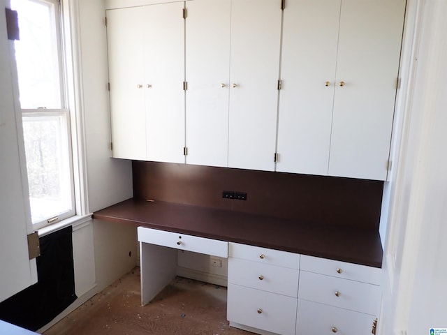 unfurnished office with built in study area