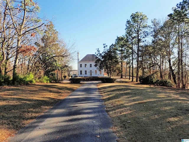 view of front of home with a front lawn