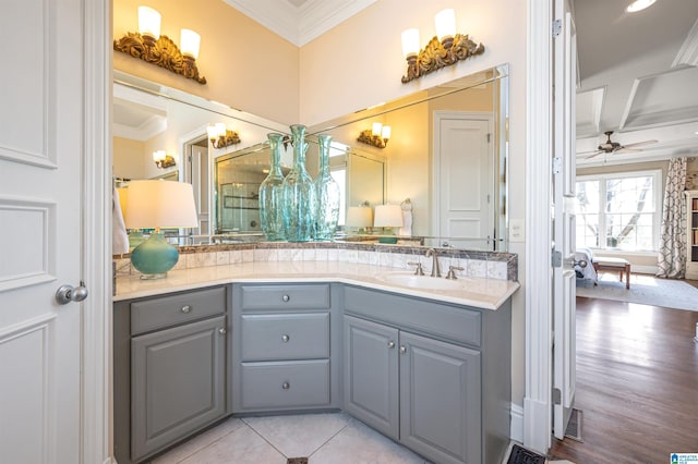 full bathroom with tile patterned floors, visible vents, crown molding, ceiling fan, and vanity