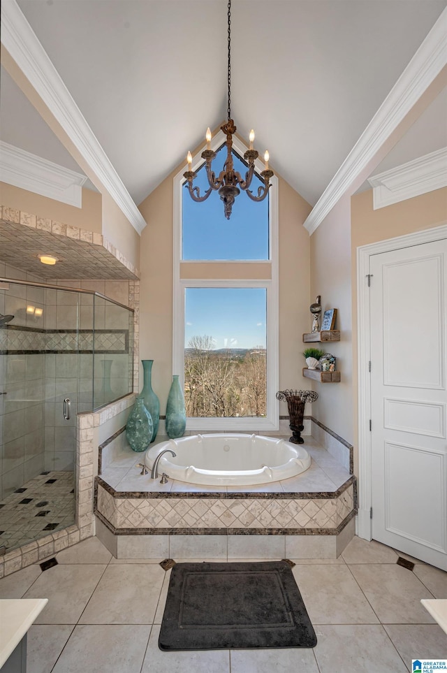 full bathroom featuring a garden tub, a stall shower, crown molding, tile patterned flooring, and lofted ceiling