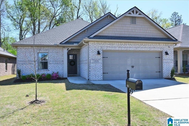 1826 SE Anise Cir SE, Cullman, AL 35055 - view of front of home with a front lawn, brick siding, a garage, and driveway