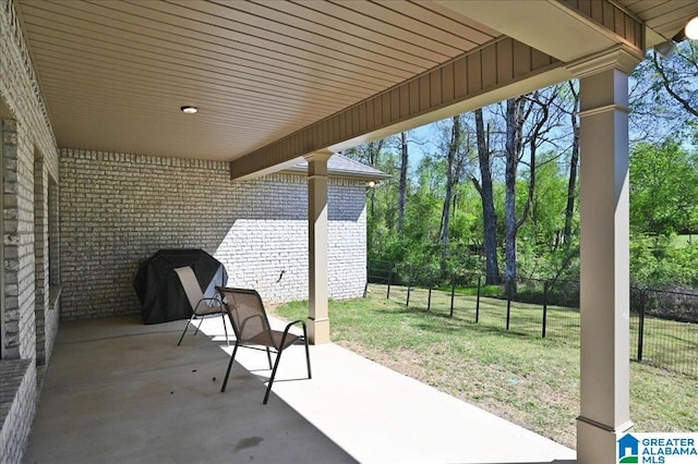 view of patio / terrace with fence and grilling area