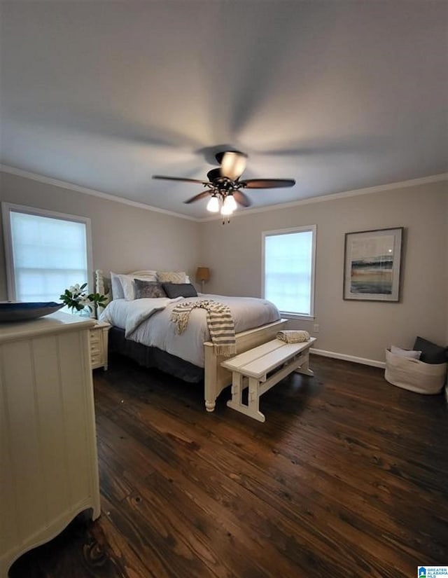 bedroom featuring ceiling fan, dark wood-type flooring, baseboards, and ornamental molding