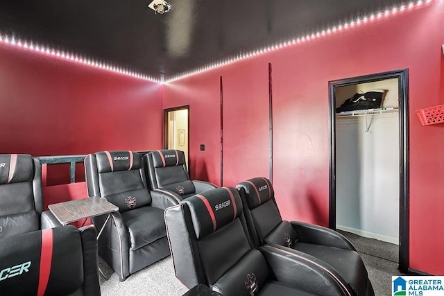 home theater with baseboards and carpet floors