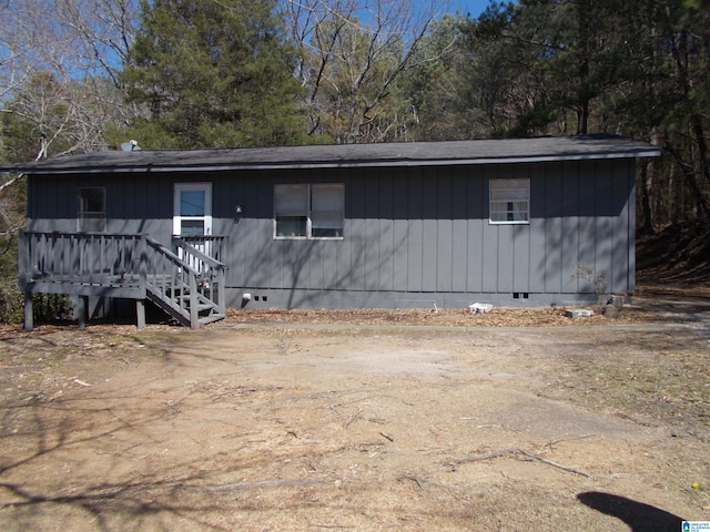 rear view of house with crawl space