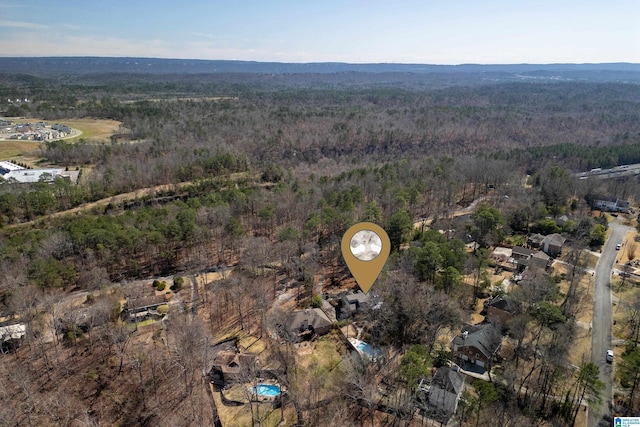 aerial view featuring a forest view