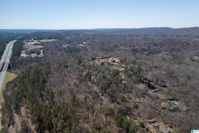 aerial view with a wooded view