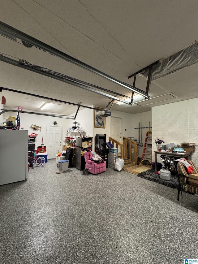 garage featuring freestanding refrigerator