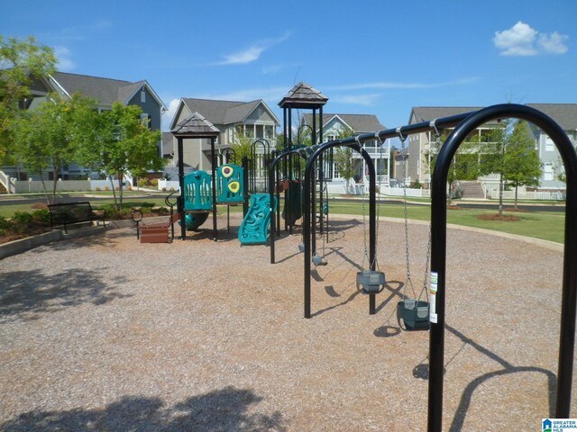 community playground with a residential view