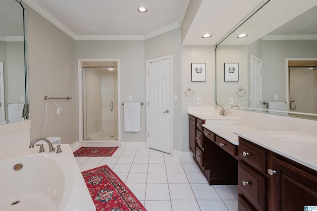 bathroom with tile patterned flooring, a shower stall, crown molding, baseboards, and a whirlpool tub