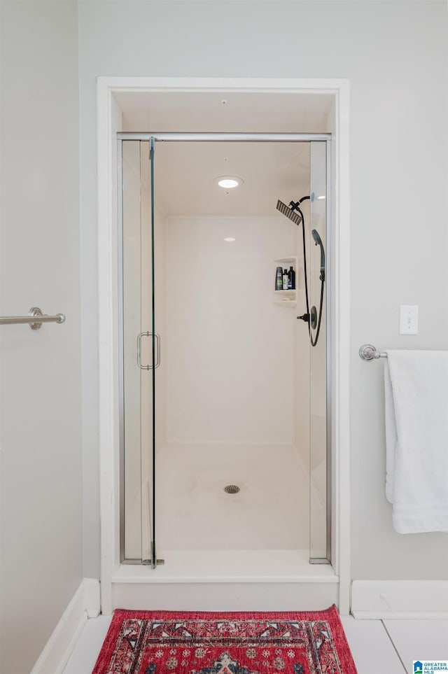 bathroom featuring a stall shower