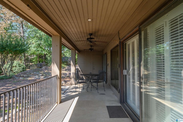 view of patio featuring outdoor dining space and a ceiling fan