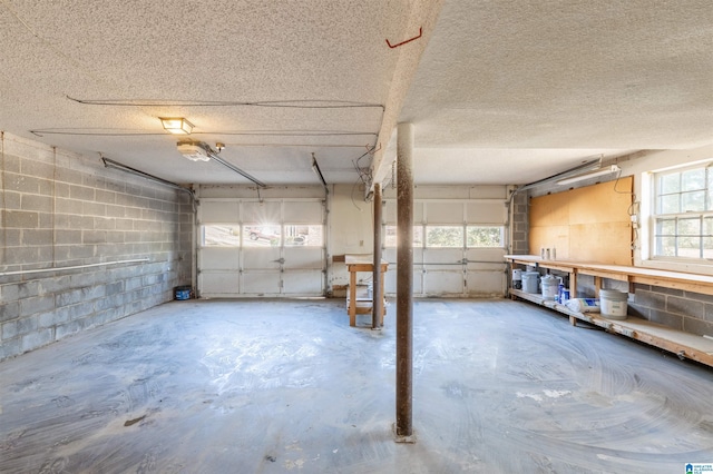 garage with concrete block wall