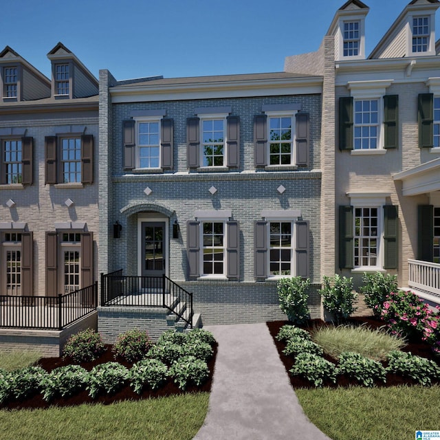 view of front of home with brick siding