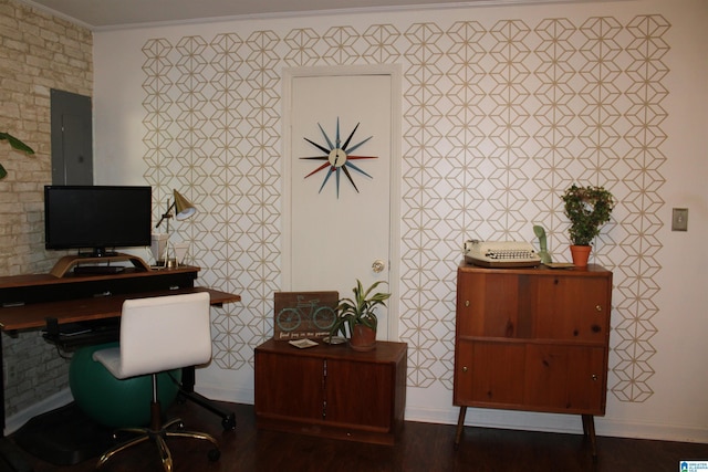 office space with electric panel, baseboards, wood finished floors, and ornamental molding