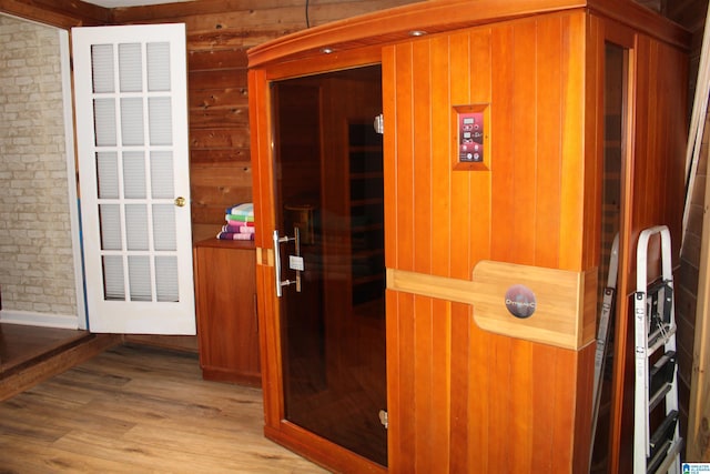 view of sauna featuring wood finished floors