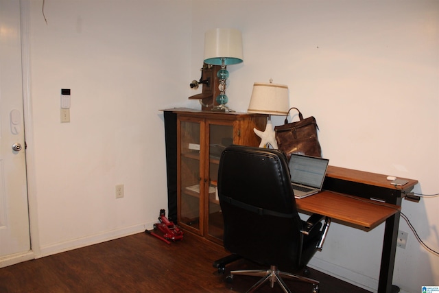 office with baseboards and wood finished floors