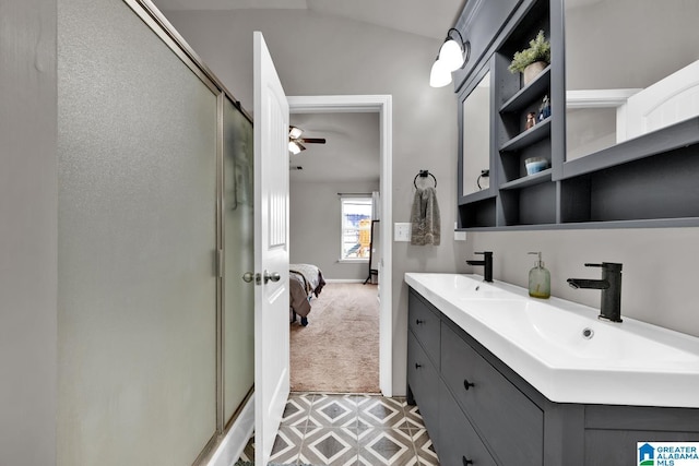 bathroom featuring a sink, ensuite bath, a stall shower, and double vanity