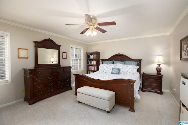 bedroom featuring baseboards, light carpet, ceiling fan, and crown molding