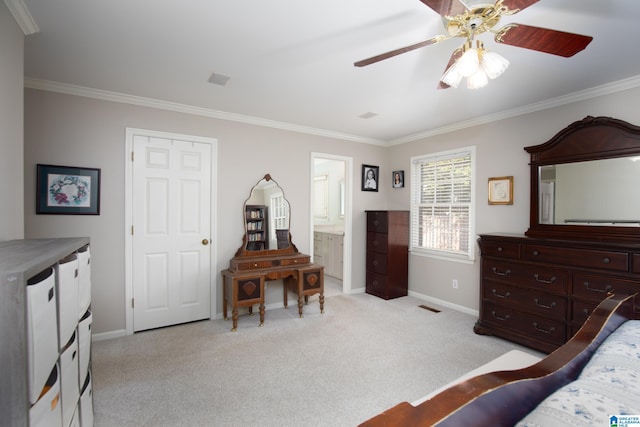 bedroom with ornamental molding, baseboards, visible vents, and light carpet