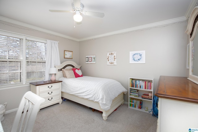 bedroom with crown molding, carpet, baseboards, and ceiling fan