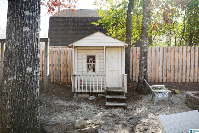 view of shed featuring a fenced backyard