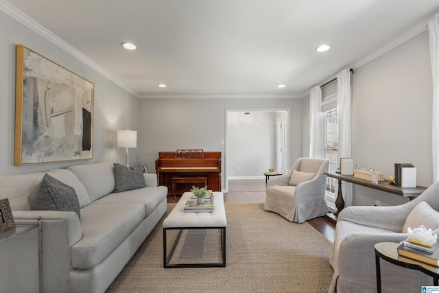 living area with recessed lighting, wood finished floors, and crown molding