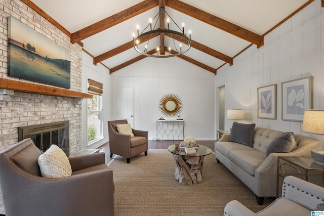 living area with a notable chandelier, a fireplace, and vaulted ceiling with beams