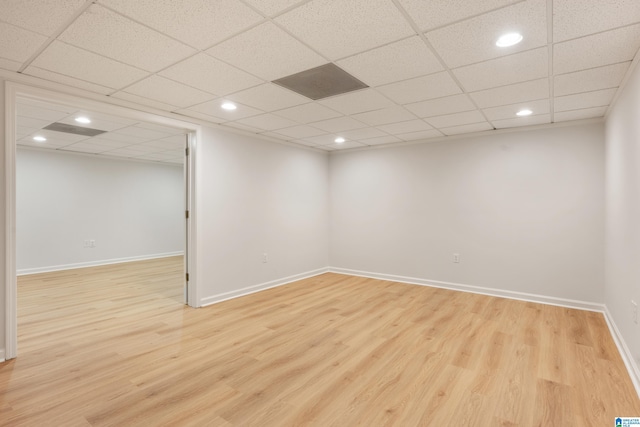 unfurnished room featuring recessed lighting, baseboards, and light wood finished floors