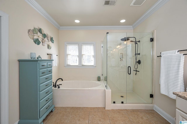 bathroom featuring a shower stall, a bath, crown molding, and visible vents