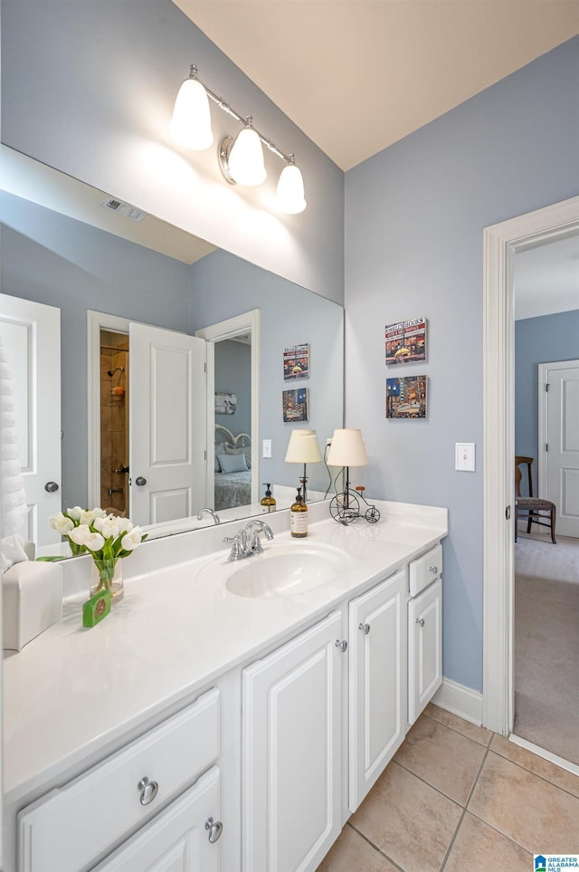 full bathroom with tile patterned floors, visible vents, ensuite bath, baseboards, and vanity