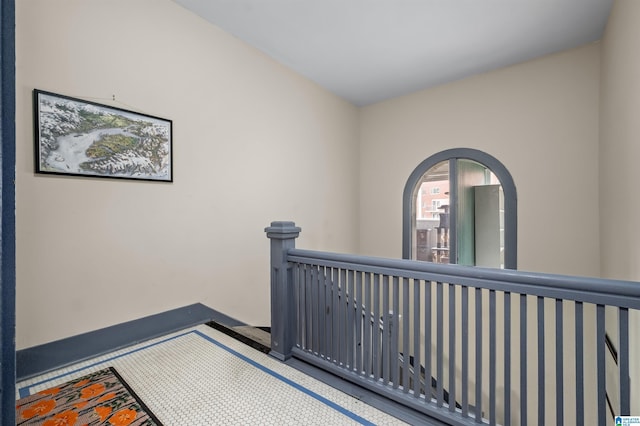 hallway with an upstairs landing