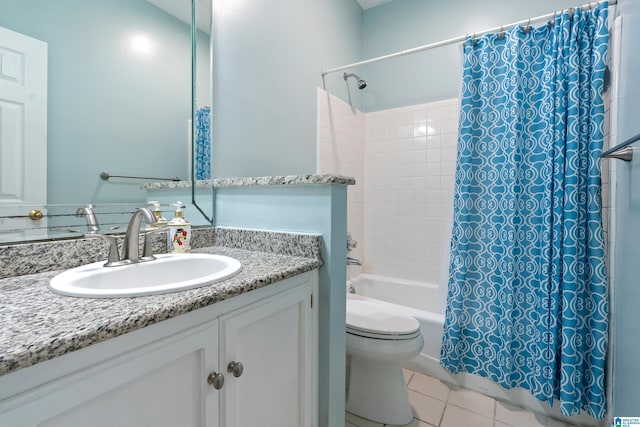 full bathroom with tile patterned flooring, vanity, toilet, and shower / tub combo