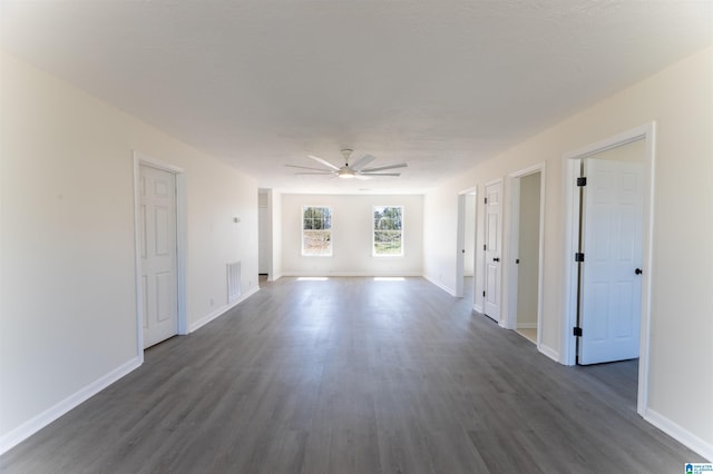 130 Alexandria Heights Cir, Alexandria, AL 36250 - spare room with visible vents, baseboards, ceiling fan, and dark wood-style flooring