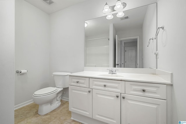 bathroom with visible vents, baseboards, toilet, and vanity