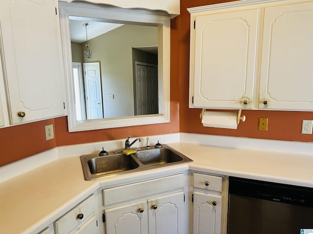 kitchen with dishwasher, white cabinetry, light countertops, and a sink