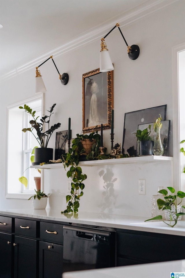 room details with dishwasher, dark cabinetry, light countertops, and ornamental molding