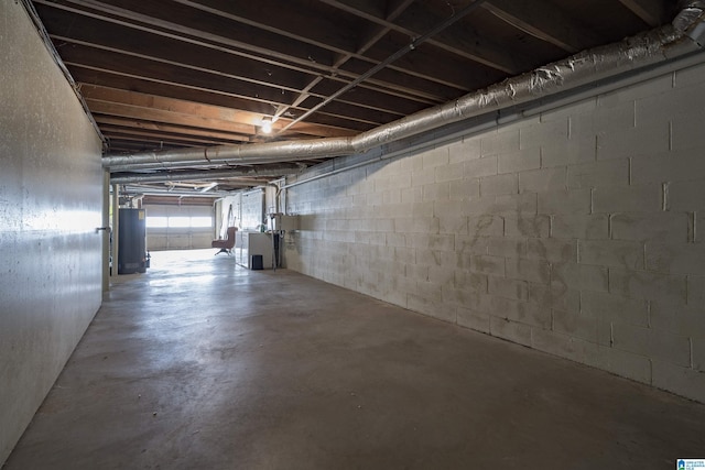 basement featuring gas water heater