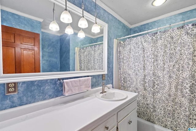 bathroom featuring shower / bathtub combination with curtain, wallpapered walls, vanity, and ornamental molding