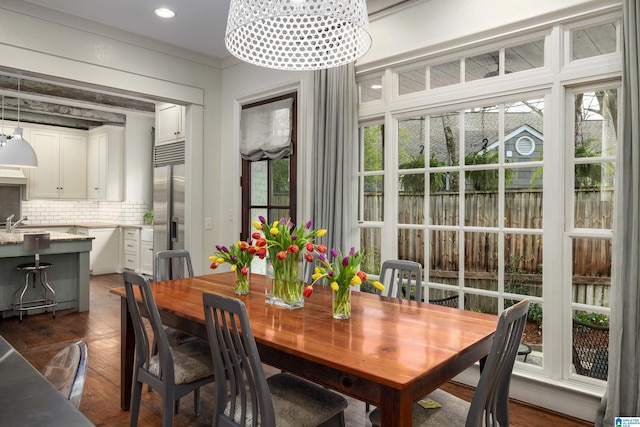 dining area featuring recessed lighting