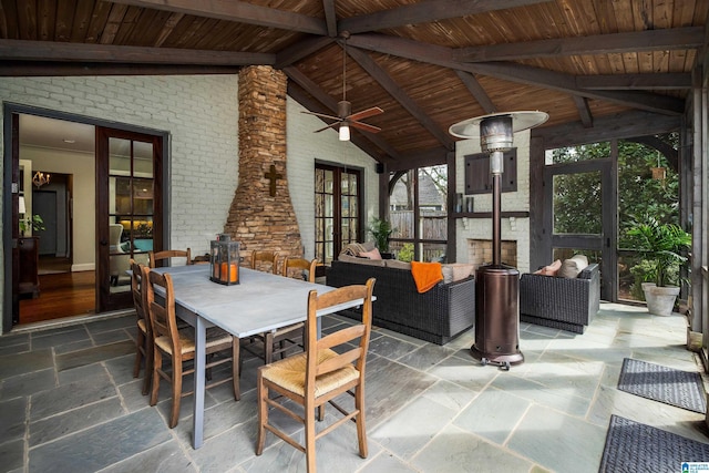 view of patio featuring an outdoor living space, outdoor dining space, and a ceiling fan