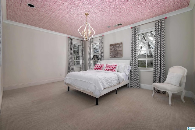 bedroom featuring visible vents, an inviting chandelier, ornamental molding, and carpet flooring